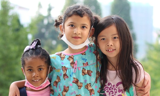 Friendship among students from different backgrounds at Qingdao Amerasia International School (QAIS), highlighting the inclusive and diverse community at this international school in Qingdao.