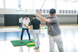 IBD Dads golfing together at Qingdao Amerasia International School community event Parent engagement and wellbeing initiative at QAIS Qingdao