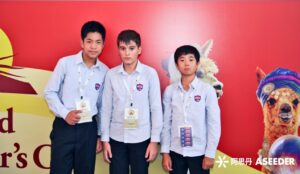 3 students on stage