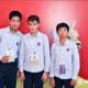 3 students on stage